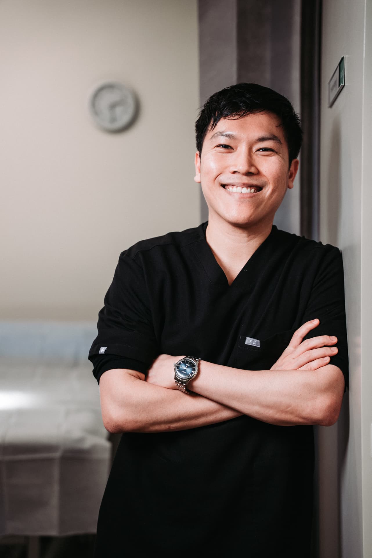 Dr William Fong in clinical attire